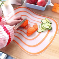 Planche à découper en plastique transparente