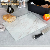 Planche à découper en verre blanc effet marbre – vue de dessus